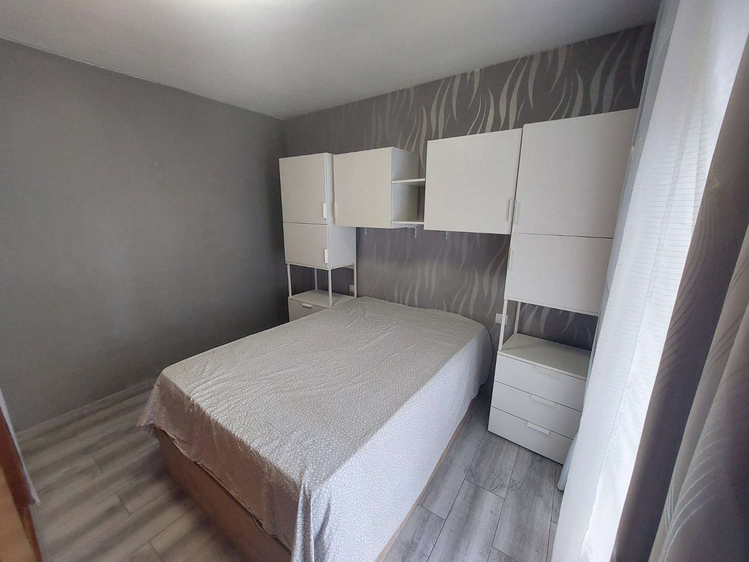 Luminoso apartamento de 2 dormitorios, con piscinas y parking comunitario
